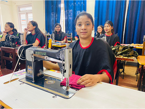 Bhiuesari at Sewing Machine